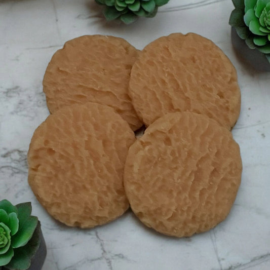 Quatre galettes de couleur crème